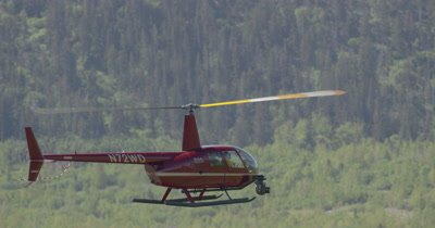 Aerial View of Helicopter With Heligimbal Camera Flying Over Alaska