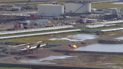 Aerial Alaska,Oil Production Facility with Natural Gas Burnoff Flames