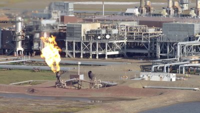 Aerial Alaska,Oil Production Facility with Natural Gas Burnoff Flames