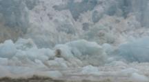 Icebergs Rolling After Calving Event Glacier Alaska 