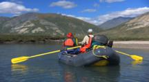 Rafters Paddle Down Alaska River