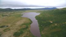Flight Following River Up To Lake With Lush Vegetation In Proposed Pebble Gold Mine Area