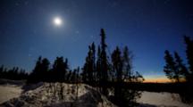 Time Lapse Moon Setting, Northern Lights (Aurora Borealis) With Pine Tree Landscape