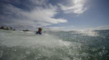 Children Enjoy The Surf At Noosa, Australia