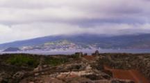 Time Lapse As Clouds Roll Over The Scenic Countryside And A Distant Village In The Azores.