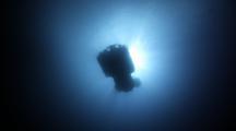 Deepsee Submersible Silhouetted By Sun