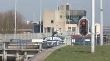 A Cargo Ship In A Dutch Lock, Still Life Of Ship And Traffic Light