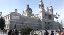 The Almudena Cathedral In Madrid Spain, People Walk By