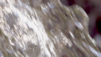 Extreme close up slow motion abstract shot of rushing water.