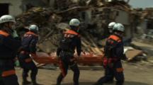 Japan Tsunami Aftermath - Rescue Team Attend To Dead Body In Rikuzentakata City