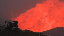 Extreme Climbers Tackle Rock Face Over Erupting Lava Lake In Volcano