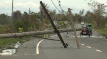 Power Lines Downed After Hurricane Lie On Road