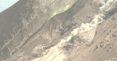 Huge Boulders Crash Down Side Of Volcano As It Erupts