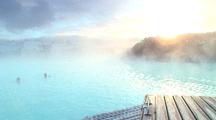 People Swim In Blue Lagoon Geothermal Spa In Iceland
