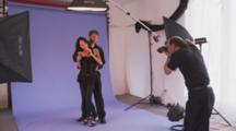 Photographer Takes Pictures Of Models In Studio