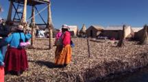 Travel Past Indigenous Women On Floating Reed Island, Pass Reed Boats