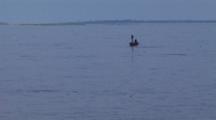 Person On Small Motorboat On Peru Lake