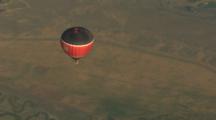 Base Jumper Jumps From Hot Air Balloon.