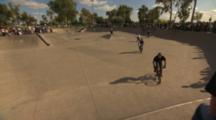 Train Of Bmx Riders Doing The Same Trick Then Breaking Loose From The Pack.