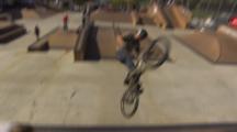 Bmx Rider Getting Big Air In A Skate Park.