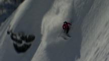 Tracking A Skier Dropping In And Jumping A Cliff Then Crashing.