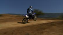 Motocross Rider Riding A Dirt Track