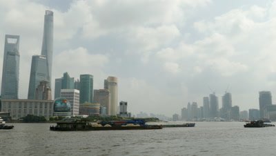Cargo Ship Sailing on Huangpu River, Shanghai, China