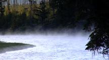 Steam Rises From The Madison River Yellowstone National Park