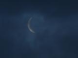 Moving Clouds Hide Crescent Moon