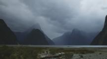 Milford Sound Coast With Blowing Vegetation, Mountains Are Visible, Cloudy And Windy Conditions, Time Lapse Of Cloud Movement