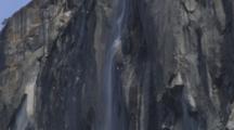 Horsetail Falls, Yosemite National Park, Ca, Shot Tilts Up The Falls To Blue Sky.