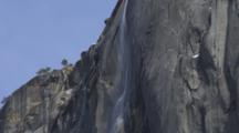 Horsetail Falls, Yosemite National Park, Ca, Shot Tilts Up The Falls To Blue Sky.