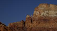 Sandstone Spires And Cliffs, Many Colors And Layers, With Clear Blue Sky. Utah.
