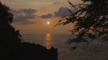 Time Lapse Over The Ocean At Sunset, Palm Trees, Acadia Trees And The Lava Coast Of Kailua-Kona, Kealakekua Bay, Hawaii.