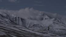 A Pan Shot Of The Snow Covered Alaska Range, Ending With Denali Visible.