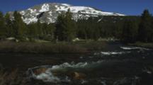 The Head Waters Of The Tuolumne River Flow Through A Mountain Stream, Shot Pans To The Left And Travels From Mammoth Mountain Over To Mt. Gibbs.