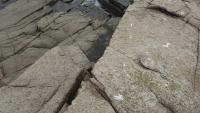 Granite cliffs meet the sea