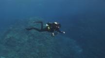 Scuba Diver Ascending, Making Safety Stop In Open Water