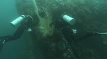Divers Work To Remove Fishing Net From Reef