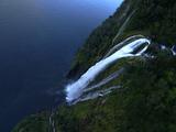 Dramatic Flight Over Fjord, Forest And Waterfall