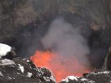 Tilt Down Layers Of Crater Inside Edge, To Splattering Lava At Centre