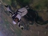 Happy Female Skydiver Jumps Out Of Plane & Somersaults Over Central Otago N.Z., Camera Spinning