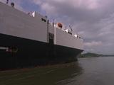L/A Ws Big Freight Ship Travelling, Pan From Stern To Bow.