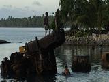 Mws, Kids Playing On Old Wreck, I Swimming In Water, Kid Jumps Into Water. Palm Trees On Island B/G