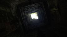 Spinning Shot Of Angkor Ruins Looking Up Chimney