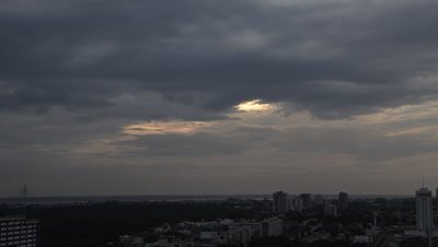 Time Lapse, Clouds Move Above City of Manaus at Sunset