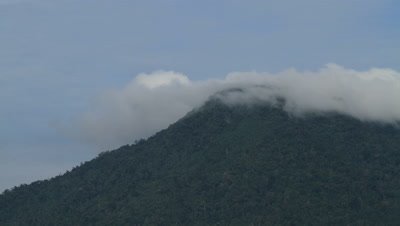 Time lapse of clouds billowing over the mountains of Tangkoko National Park