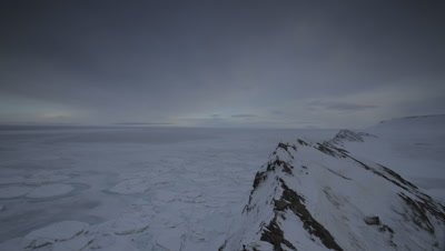 Timelapse clouds/sun moving over the tundra