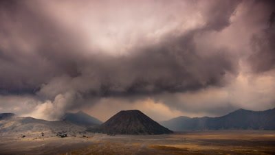 Time lapse of clouds moving over Volcanoes spewing volcanic ash at Bromo Tengger Semeru National Park