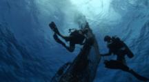 Divers Try To Secure  A Lost Drifting Fishingnet 
